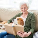 Senior Woman Relaxing at Home with Pet